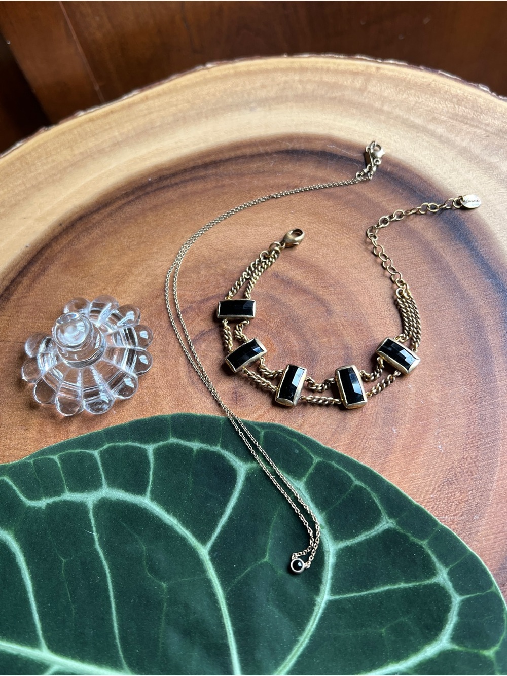 Set of two. Gold-Tone Bracelet and Necklace with Onyx Stones